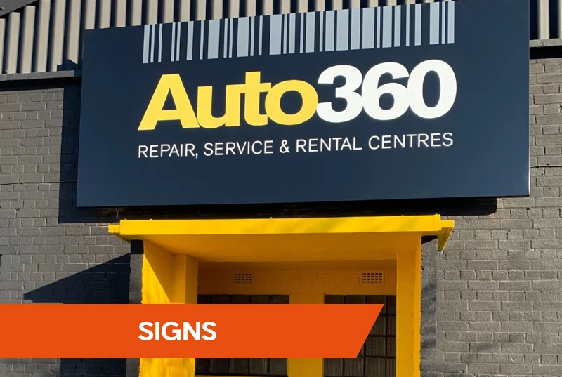 Sign Services with company outdoor sign behind